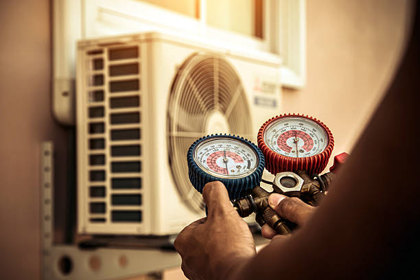 Professional Air Conditioning Service technician working in Union, MO
